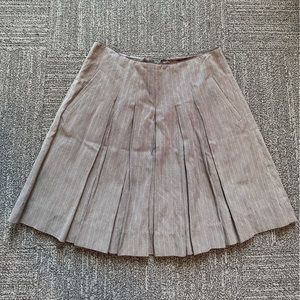 Cabi, pleated mini skirt. Dark plaid color